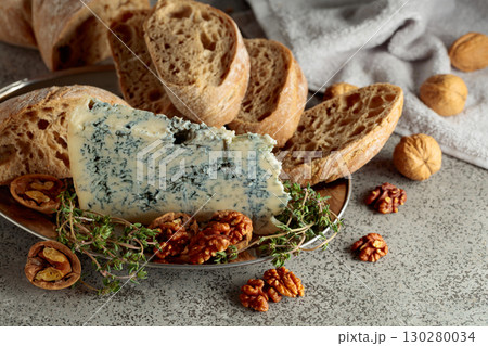 Gorgonzola with ciabatta, walnuts, and thyme. 130280034
