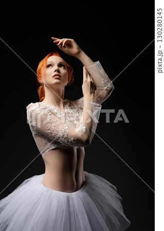 Captivating beauty of a nude woman adorned in tulle under vibrant lighting Captivating beauty of a nude woman adorned in tulle under vibrant lighting 130280145