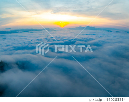 Amazing Sunrise over mountains hills covered with mist, Aerial view landscape drone shot beautiful sky colorful light nature background 130283314