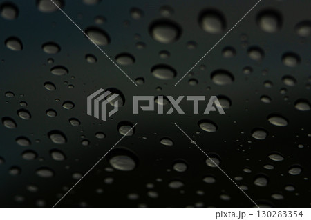 water drops on black background water drops on black background 130283354