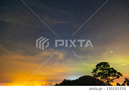 Night landscape with Milky Way star over mountains Colorful Starry sky with clouds,Nature and go to travel adventure concept Night landscape with Milky Way star over mountains Colorful Starry sky with clouds,Nature and go to travel adventure concept 130283358