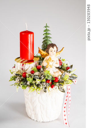 Advent composition with candles, table handmade arrangement mini decoration for new year, artificial Christmas tree interior decoration Advent composition with candles, table handmade arrangement mini decoration for new year, artificial Christmas tree interior decoration 130283948