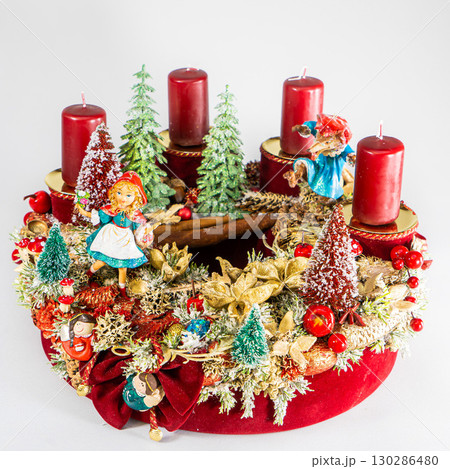 Christmas table composition. Beautiful decoration. Christmas trees, candles, stars, lights and elegant accessories. Merry Christmas and Happy Holidays, Template. 130286480