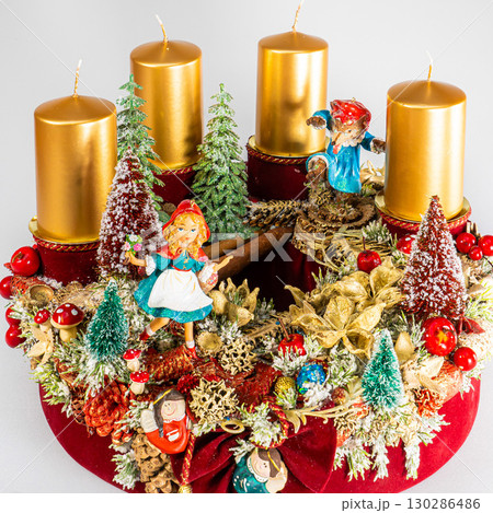 Christmas table composition. Beautiful decoration. Christmas trees, candles, stars, lights and elegant accessories. Merry Christmas and Happy Holidays, Template. 130286486