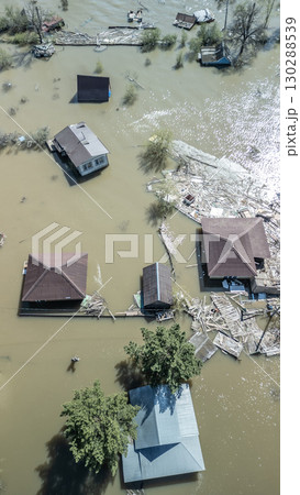 Floods and cyclone, global warming. Climate change,natural disasters the tsunami of nature.The apocalypse, catastrophes.Storms and destruction.The remnants of human life are floating in dirty water Floods and cyclone, global warming. Climate change,natural disasters the tsunami of nature.The apocalypse, catastrophes.Storms and destruction.The remnants of human life are floating in dirty water 130288539