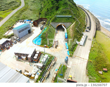 秋の北海道乙部町で鳥山トンネルの工事現場の風景を空撮 秋の北海道乙部町で鳥山トンネルの工事現場の風景を空撮 130288707