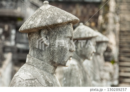 Guardian statues standing in formation at Khai Dinh mausoleum Hue Vietnam 130289257