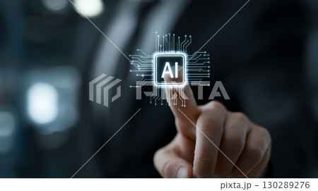 Artificial intelligence concept with person pointing at glowing AI chip icon, technology innovation and digital future idea 130289276