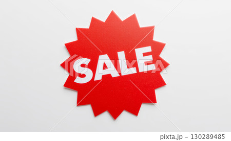 Red sale sign with white text on white background, bright and eye catching promotional label for discount or special offer 130289485