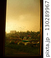Rainy days and golden hues. There's a quiet beauty in watching the world through a rain-kissed window. 130289967