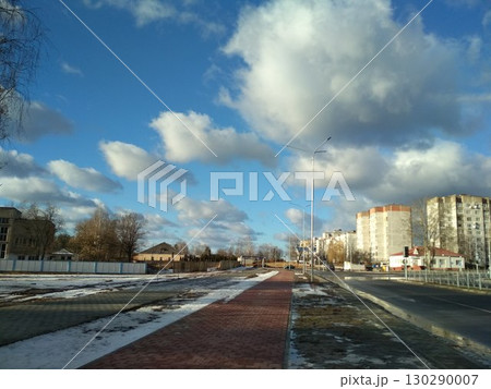 Beautiful cityscape with blue sky and clouds Beautiful cityscape with blue sky and clouds 130290007