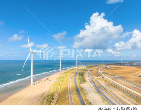Wind turbine on the seashore. Renewable and natural energy sources. Green energy. 130290269