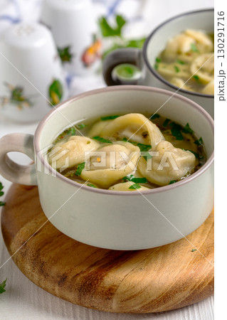 Warm Tortellini Soup Delight. Warm Tortellini Soup Delight. 130291716