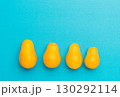 Yellow pear tomatoes on blue background, healthy vegetable concept 130292114