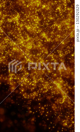 Dense field of glowing golden particles creating a sense of depth and sparkling movement in space Dense field of glowing golden particles creating a sense of depth and sparkling movement in space 130292829
