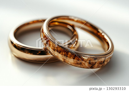 Pair of Wedding Rings on a white background. 130293310