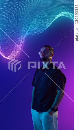 Contemporary collage. Man in casual shirt standing under glowing digital wave with thoughtful mood 130293582