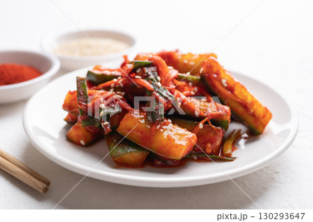 Korean kimchi cucumber on white plate, Korean side dish, Homemade food 130293647