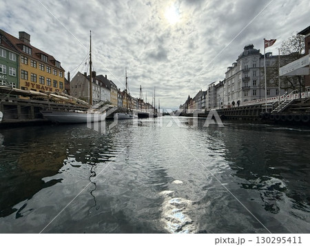 Scenic summer view of color buildings and boats of Nyhavn in Copenhagen, Denmark 130295411