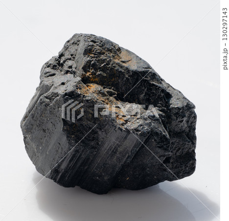 Striking Black Tourmaline Crystal Cluster: Raw, Dark Mineral Specimen with Golden Flecks, Natural Stone, Geological Beauty, Dramatic Lighting 130297143