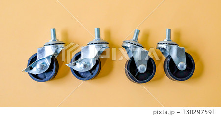 Spare part of cart wheel on color background. Spare part of cart wheel on color background. 130297591