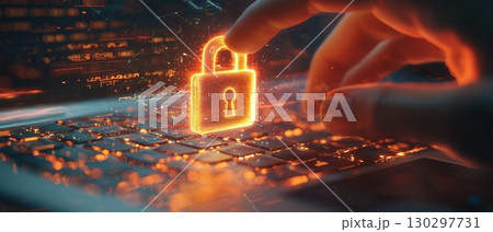 A hand is pointing to a glowing lock on a keyboard 130297731