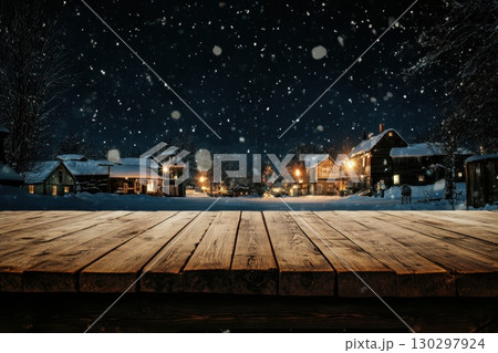 A snowy scene with a wooden board in the foreground A snowy scene with a wooden board in the foreground 130297924