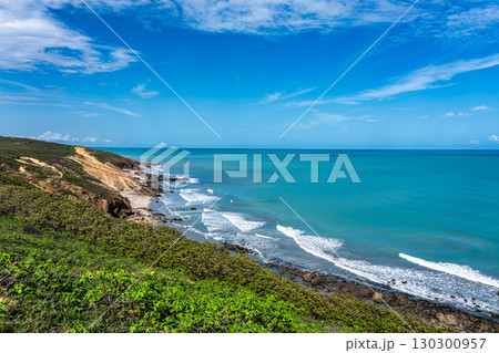 Trail along the coast and beaches from Jericoacoara to Pedra Furada in Ceara State, Brazil. 130300957