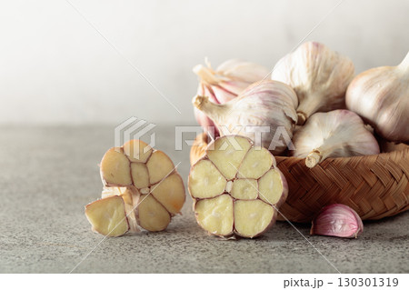 Garlic on a kitchen table. 130301319
