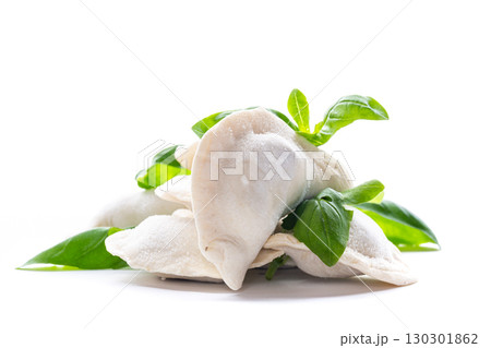 Hand-made dumplings with freezing on the table 130301862