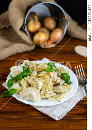 Homemade dumplings with delicious filling and seasonings Homemade dumplings with delicious filling and seasonings 130301866