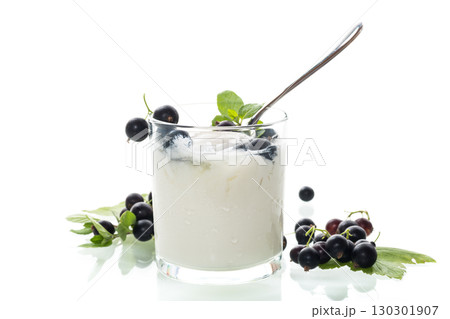 Creamy blackcurrant dessert on white background 130301907