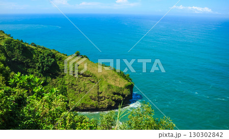 Awesome view of bukit jerit in Indonesia. Amazing cliff and ocean tropical island Awesome view of bukit jerit in Indonesia. Amazing cliff and ocean tropical island 130302842