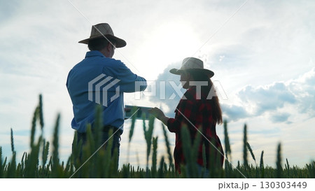New deal in the village, Responsible farming handshake, United farmers on wheat field, Growing together in agriculture, Friendly relationship on nature, Strong connection in rural business, Two men New deal in the village, Responsible farming handshake, United farmers on wheat field, Growing together in agriculture, Friendly relationship on nature, Strong connection in rural business, Two men 130303449