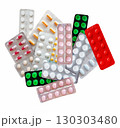 Medicines in the form of multi-colored tablets in blisters on a white background 130303480