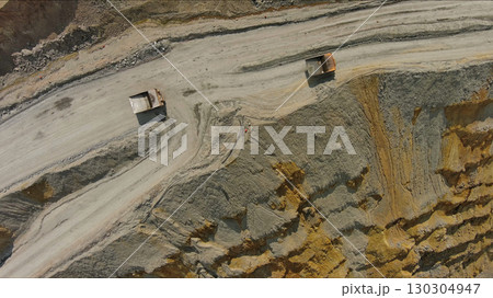 Aerial of open mine and heavy mining equipment 130304947