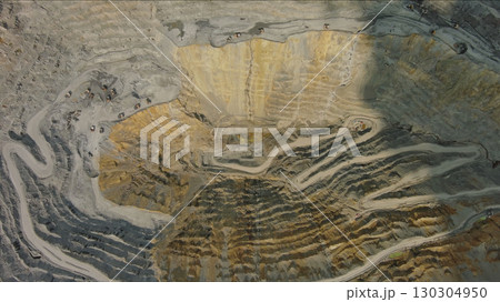 Aerial of open mine and heavy mining equipment Aerial of open mine and heavy mining equipment 130304950