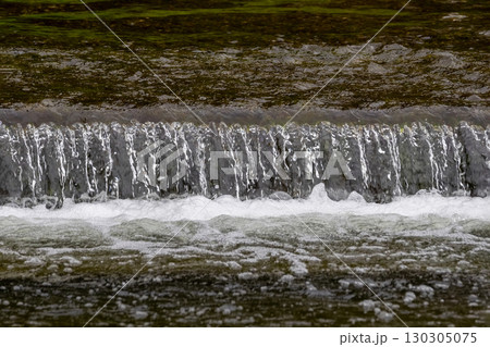 the water cascading down the river the water cascading down the river 130305075