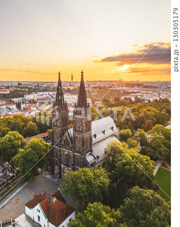 Vysehrad Basilica of St. Peter and St. Paul stands tall against a stunning sunrise in Prague. 130305179