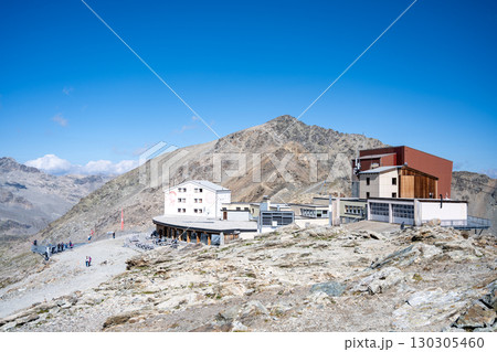 Diavolezza Mountain Hut stands majestically in the Bernina Range, surrounded by stunning alpine scenery. Visitors enjoy hiking and breathtaking views of the Swiss Alps. 130305460