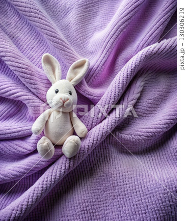 Stuffed Rabbit on Purple Blanket. Generative AI 130306219