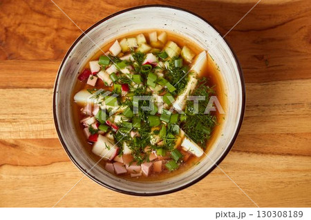Delicious Fresh Vegetable Soup made with vibrant Herbs and flavorful Seasoning for your meal 130308189