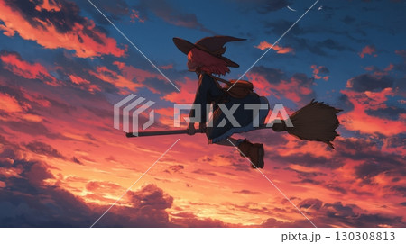 夕焼け空を飛ぶ魔女のシルエット 130308813