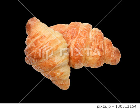 freshly baked croissants  Top view shot, flat lay. Homemade food concept on  black   background. 130312154
