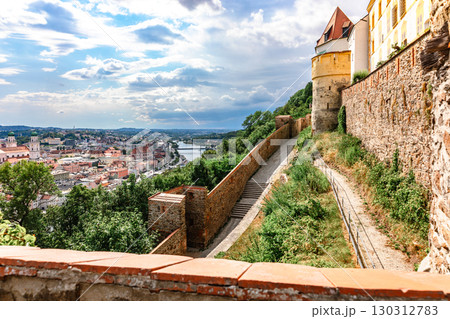 Panoramic view of Passau. Aerial skyline of old town from Veste Oberhaus castle . Confluence of three rivers Danube, Inn, Ilz, Bavaria, Germany. Panoramic view of Passau. Aerial skyline of old town from Veste Oberhaus castle . Confluence of three rivers Danube, Inn, Ilz, Bavaria, Germany. 130312783