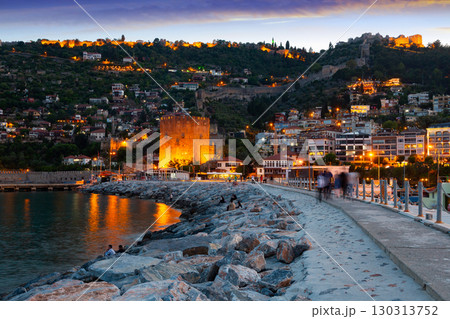 Twilight view of Alanya on Mediterranean coast with Kizil Kule and castle 130313752