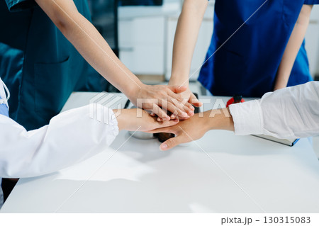 Team Doctors nurses union coordinate hands Teamwork Concept in hospital for success and trust Team Doctors nurses union coordinate hands Teamwork Concept in hospital for success and trust 130315083