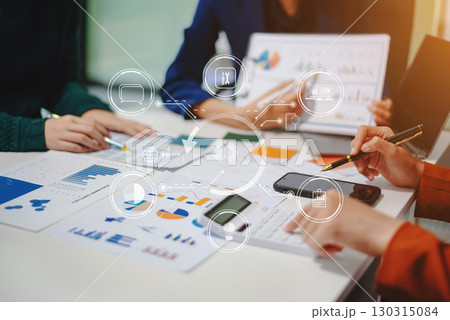 Close up view of UI developer team brainstorming on their project with laptop, smartphone and digital tablet. 130315084