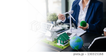 Business planning hand using laptop for working technology and business Net zero and carbon neutral concept.NET ZERO Business planning hand using laptop for working technology and business Net zero and carbon neutral concept.NET ZERO 130315168