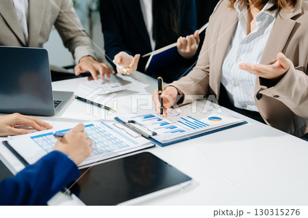 Business team collaboration discussing working analyzing with financial data and marketing growth report graph 130315276